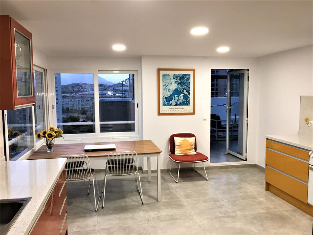 Kitchen dinning room with coastal style chairs