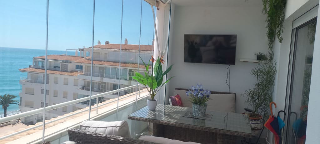 Terrace renovation and glass enclosure